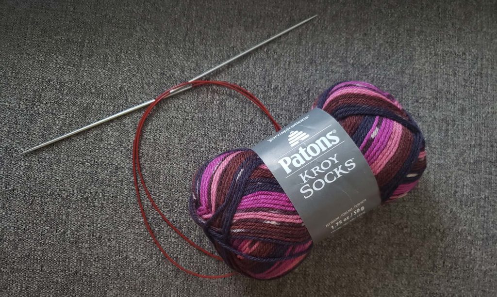 Yarn and knitting needles